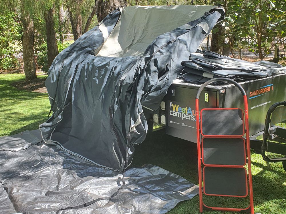 Unfolding trailer tent